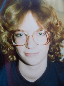 Bad perm and worse glasses