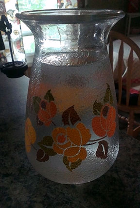 vintage vase with decoupage orange flowers