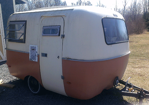 Boler trailer with orange bottom and cream top