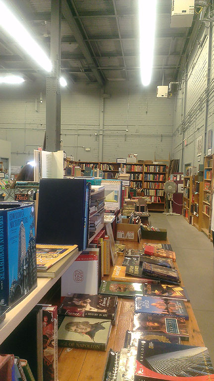 books in a giant warehouse setting