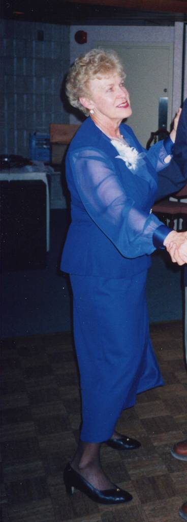 Grandma dancing, in a blue dress, at our wedding